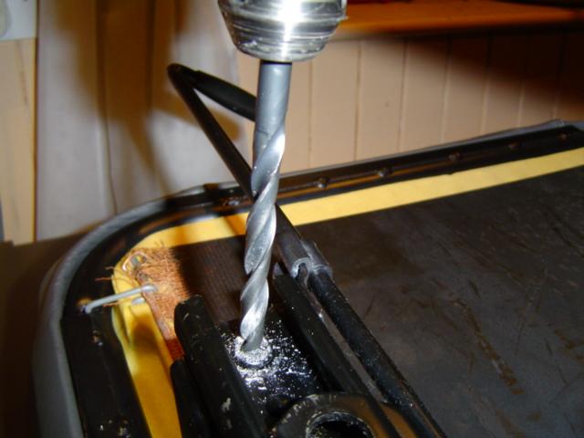 001 Front mount, drilling rivit head off.jpg